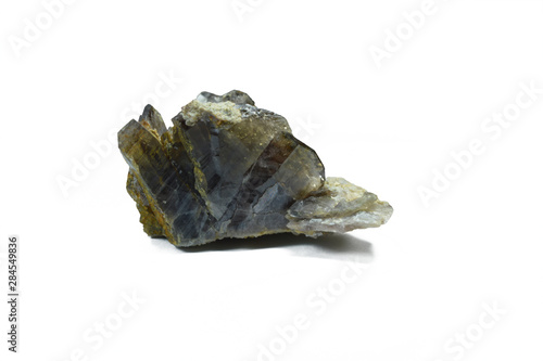 Axinite crystal specimen with quartz isolated on white background