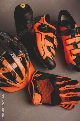Helmet, gloves and water bottle - bicycle accessories