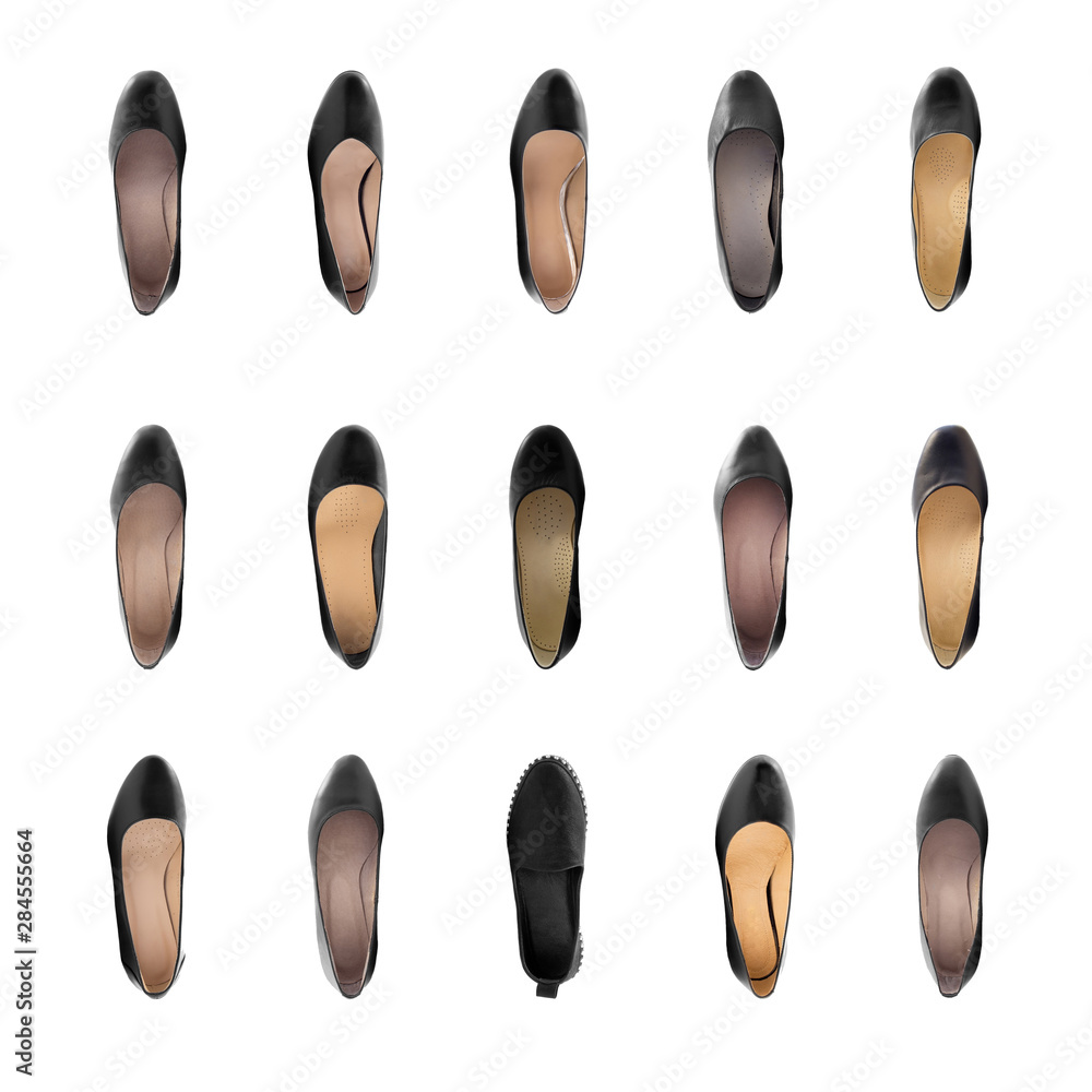 Collection of women's shoes on a white background isolated. View from above Collection of women's shoes on a white background isolated. View from above