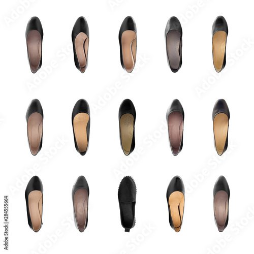 Collection of women's shoes on a white background isolated. View from above