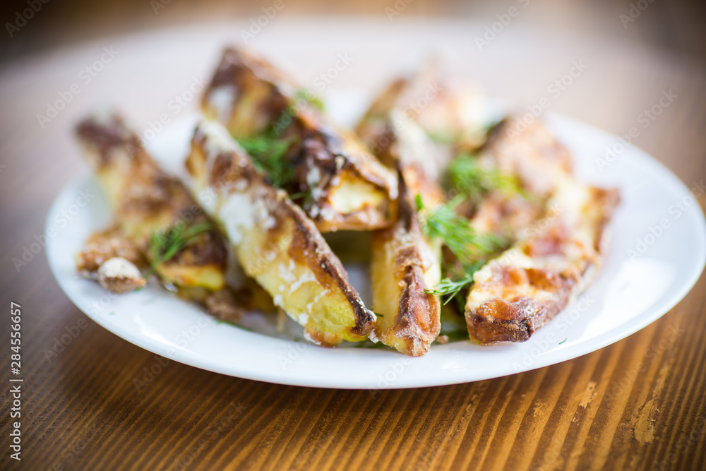 oven-baked zucchini in batter with garlic and herbs oven-baked zucchini in batter with garlic and herbs