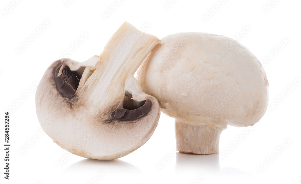 mashrooms whole and sliced champignons isolated on white background mashrooms whole and sliced champignons isolated on white background