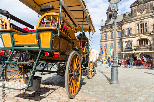 Excursion wagon with a horse in old European town