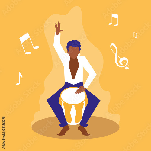 man playing bongo drum artists