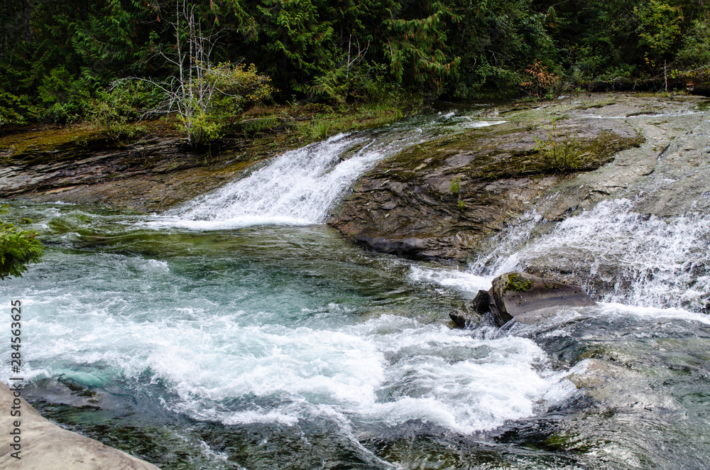 Naklejka premium Downriver at Nymph Falls