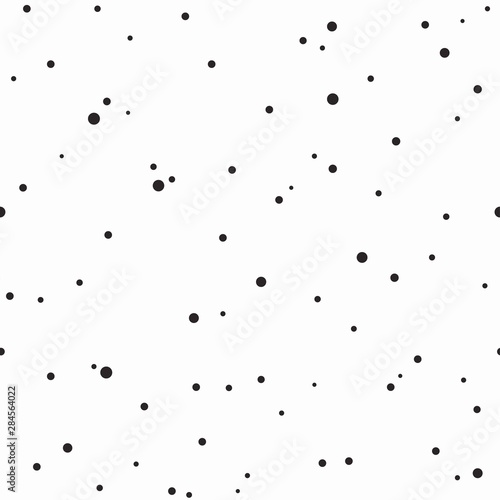 Seamless abstract pattern of little circles and dots on white. Decorative wallpaper, good for printing.