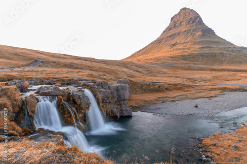 Kirkjufell Mountain and Waterfalls, Snaefellnes Peninsula, Iceland. Long exposure with moving water