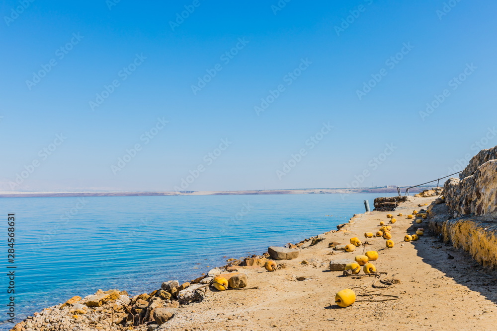 view of the coast of the Dead Sea resort area in Jordan 