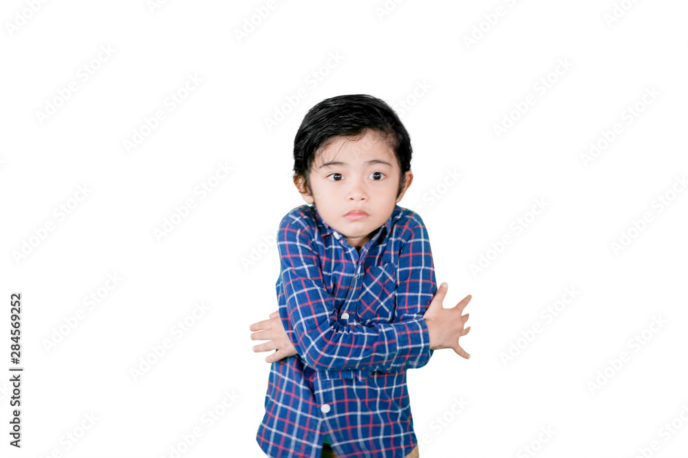 Little boy shivering from cold on studio Little boy shivering from cold on studio