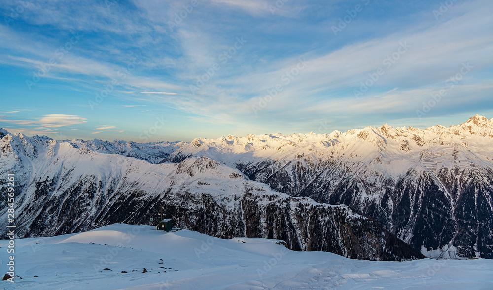 Panorama of the Alpine mountains in the evening at the ski resort of Ischgl, Austria