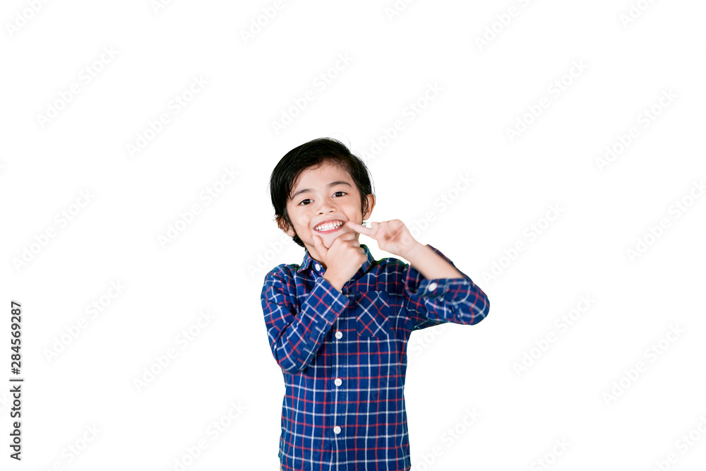 Little boy showing his healthy teeth on studio Little boy showing his healthy teeth on studio