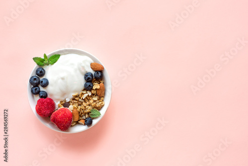 Granola with yogurt and berries photo