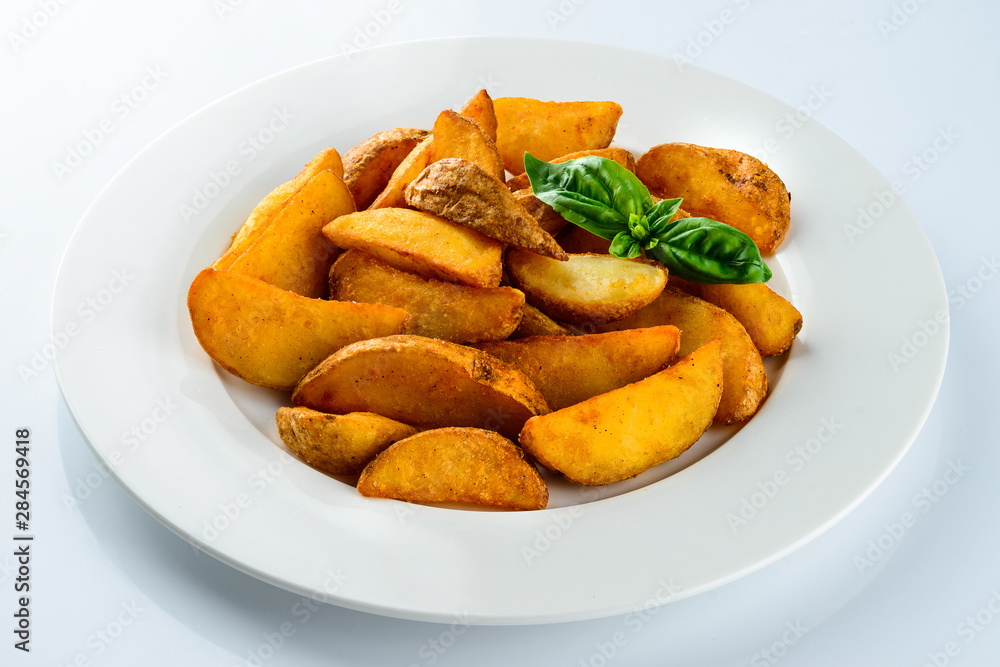 rustic french fries slices on a light background rustic french fries slices on a light background