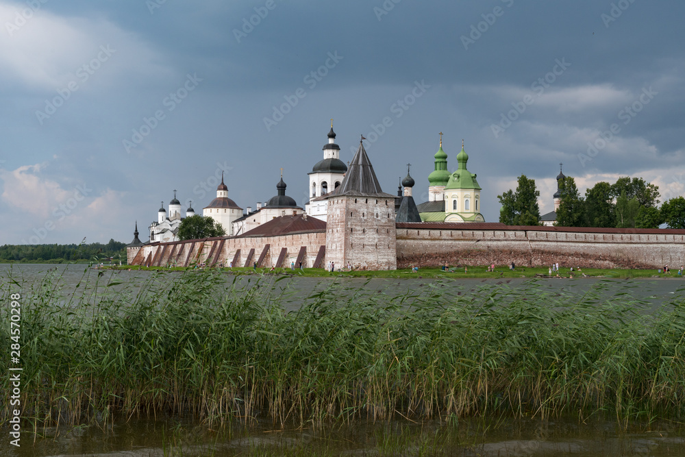 View from lake to Kirillo-Belozersky monastery. Monastery of the Russian Orthodox Church, located within the city of Kirillov, Vologda region. View from lake to Kirillo-Belozersky monastery. Monastery of the Russian Orthodox Church, located within the city of Kirillov, Vologda region.