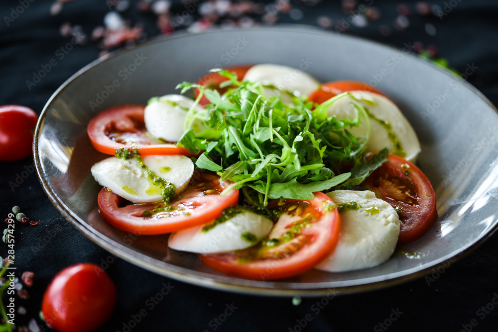 italian caprese salad with fresh mozzarella, tomatoes & basil italian caprese salad with fresh mozzarella, tomatoes & basil
