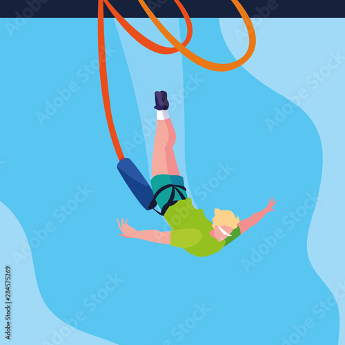 man practicing bungee jumping sport extreme
