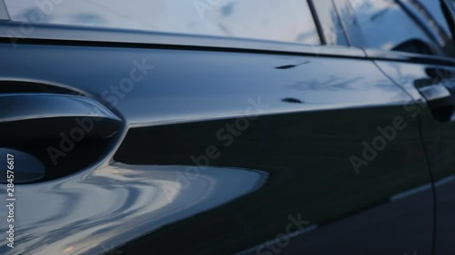 Petrol cap cover and door of modern car photo