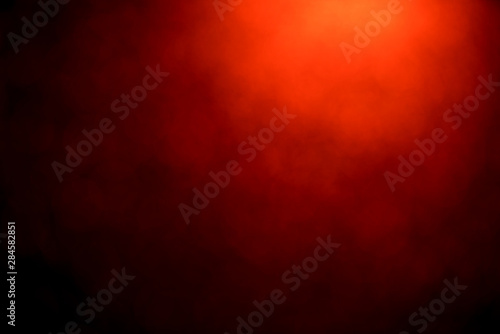 Red bokeh mistical abstract background. Defocused light.