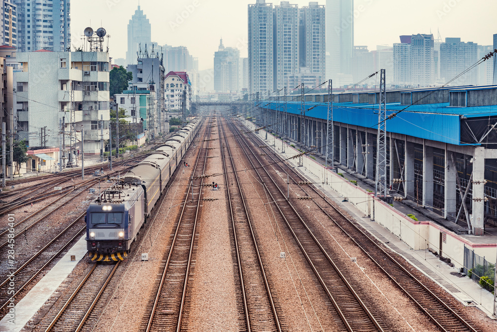 Passenger train approaches to the station. Shenzhen. China.