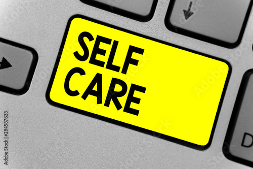 Writing note showing Self Care. Business photo showcasing Give comfort to your own body without professional consultant Keyboard yellow key Intention computer computing reflection document photo