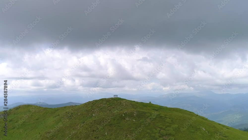 The flight near the four dancing people on the mountain top The flight near the four dancing people on the mountain top