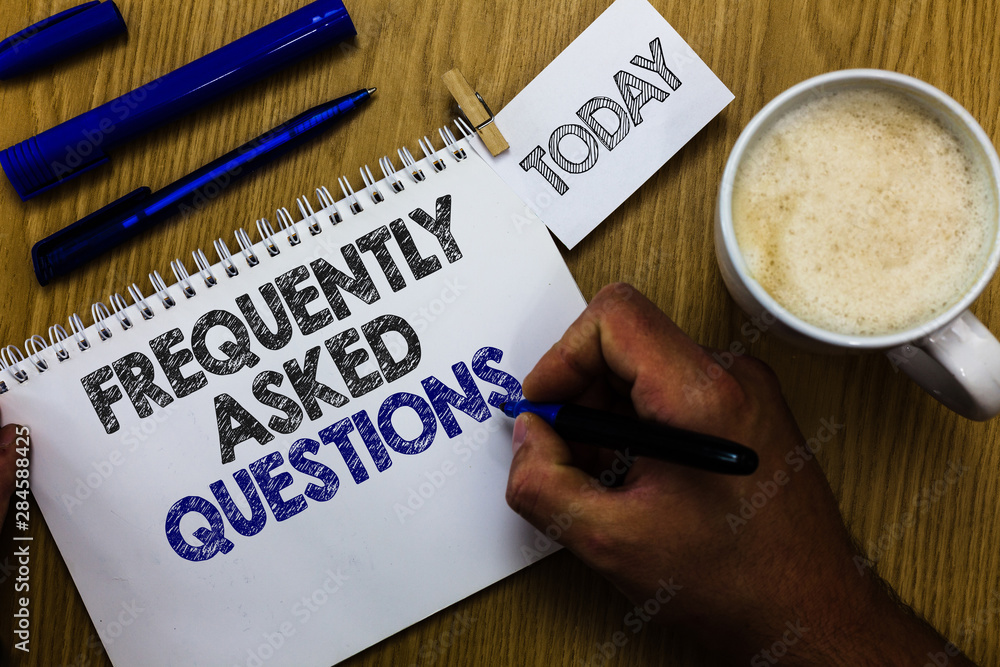 Text sign showing Frequently Asked Questions. Conceptual photo inquries that been informed more than one time Man holding marker notebook clothespin reminder wooden table cup coffee Text sign showing Frequently Asked Questions. Conceptual photo inquries that been informed more than one time Man holding marker notebook clothespin reminder wooden table cup coffee