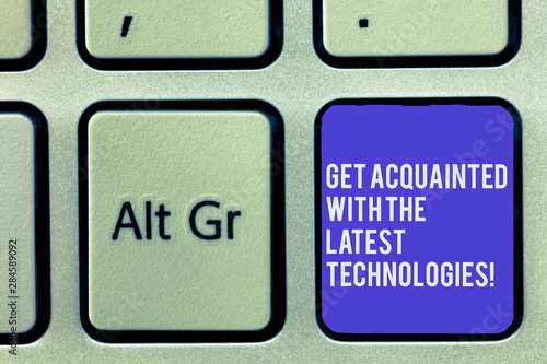 Text sign showing Get Acquainted With The Latest Technologies. Conceptual photo Be up to date have knowledge Keyboard key Intention to create computer message, pressing keypad idea photo