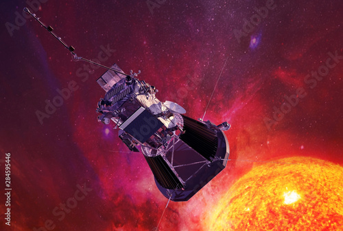 A probe to study the sun, approaching a star. Elements of this image were furnished by NASA