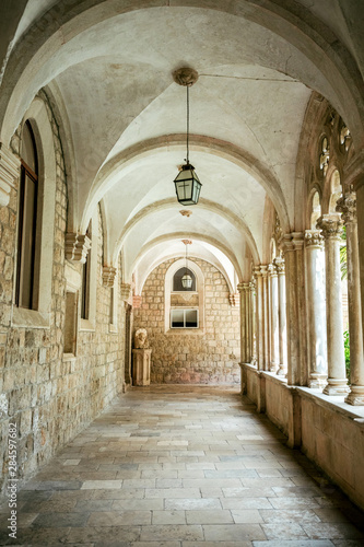 Courtyard with columns and arches in old Dominican monastery in Dubrovnik, Croatia