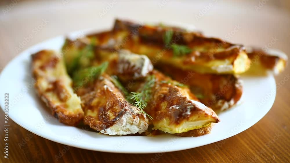 oven-baked zucchini in batter with garlic and herbs oven-baked zucchini in batter with garlic and herbs