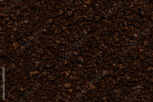 Background close up of ground coffee beans
