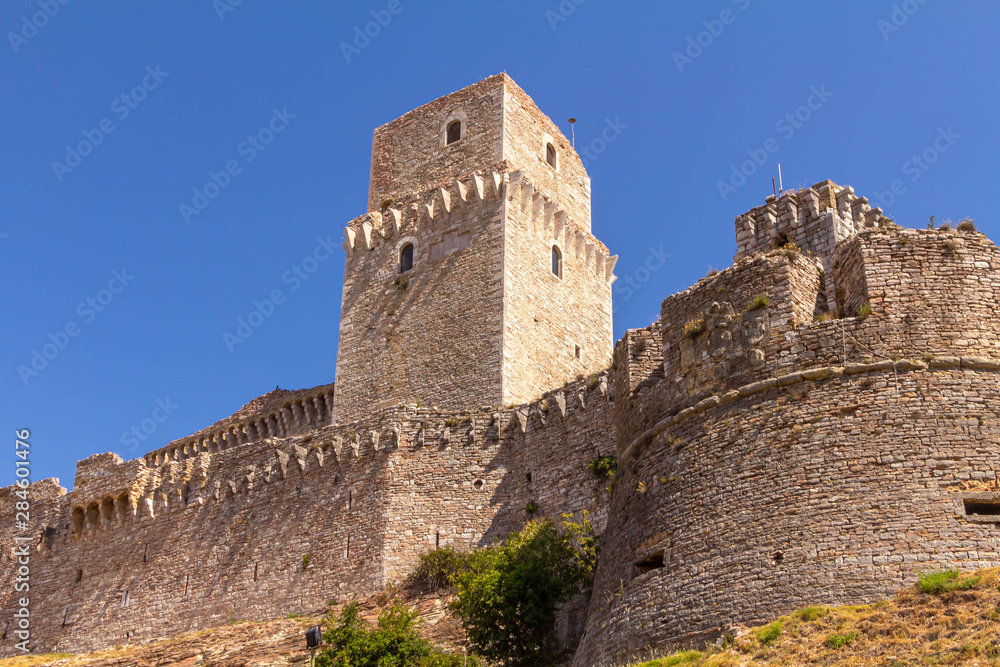 The castle for Rocca Maggiore on a hill above the city of Assisi in Umbria, Italy