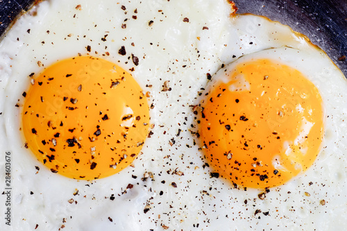 Slika na platnu Breakfast of Fried Eggs Sunny Side Up
