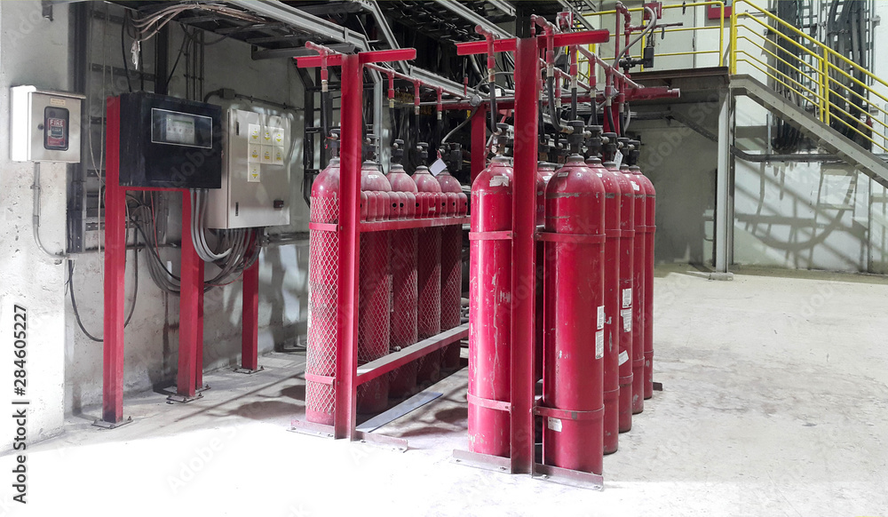 Fire fighting system red pipe have manual valves and pressure gauge to storage tank in factory Fire fighting system red pipe have manual valves and pressure gauge to storage tank in factory