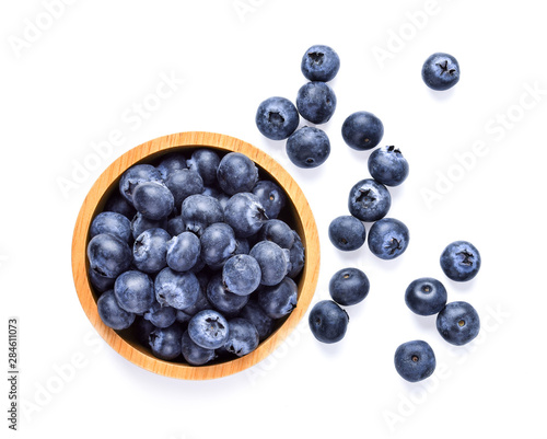 blueberry fresh in wood bowl on white background