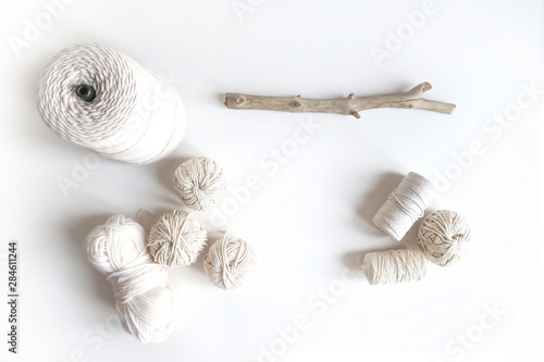 Boho white mockup with cotton yarn on the desk. Top view flat lay. Space for your text photo