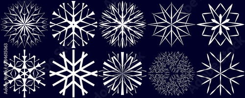10 white vector snowflakes in hand drawing style on dark blue background. Set of elements for logos, icons on winter themes.