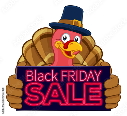 Pilgrim Turkey Thanksgiving bird animal cartoon character wearing a pilgrims hat. Holding a Black Friday Sale sign.