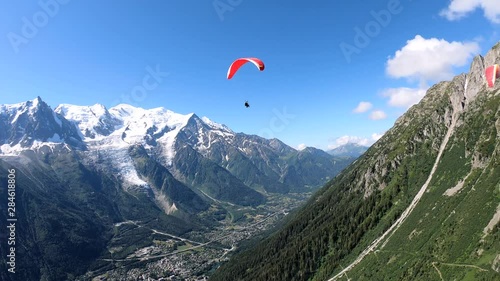 Paragliding. View of the Chamonix Resort from a height, France .4k