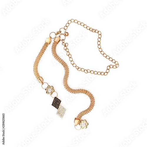 Golden necklaces isolated on a white background