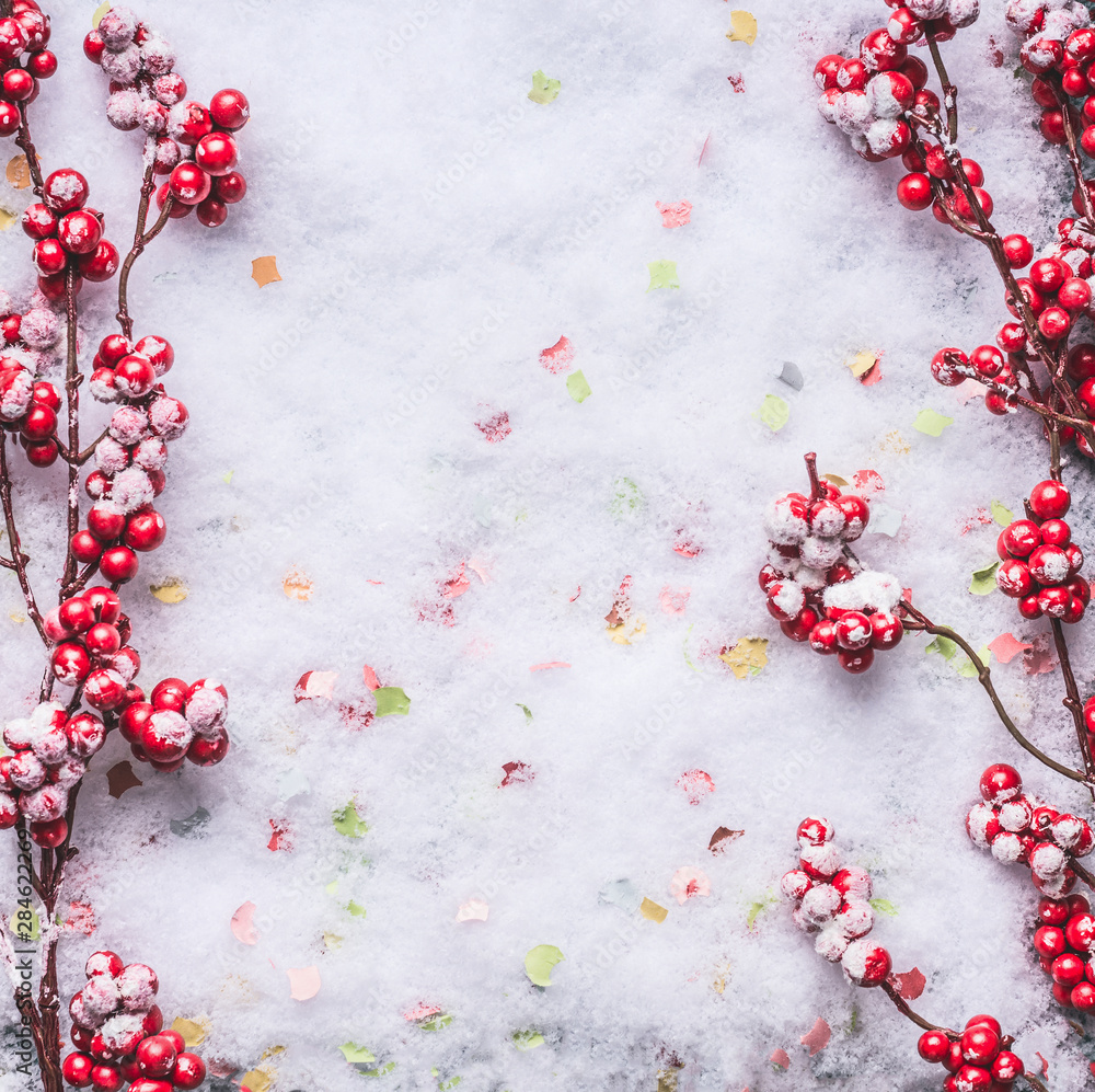Red frozen berries on snow background. Winter and Christmas layout. Flat lay . Copy space Red frozen berries on snow background. Winter and Christmas layout. Flat lay . Copy space