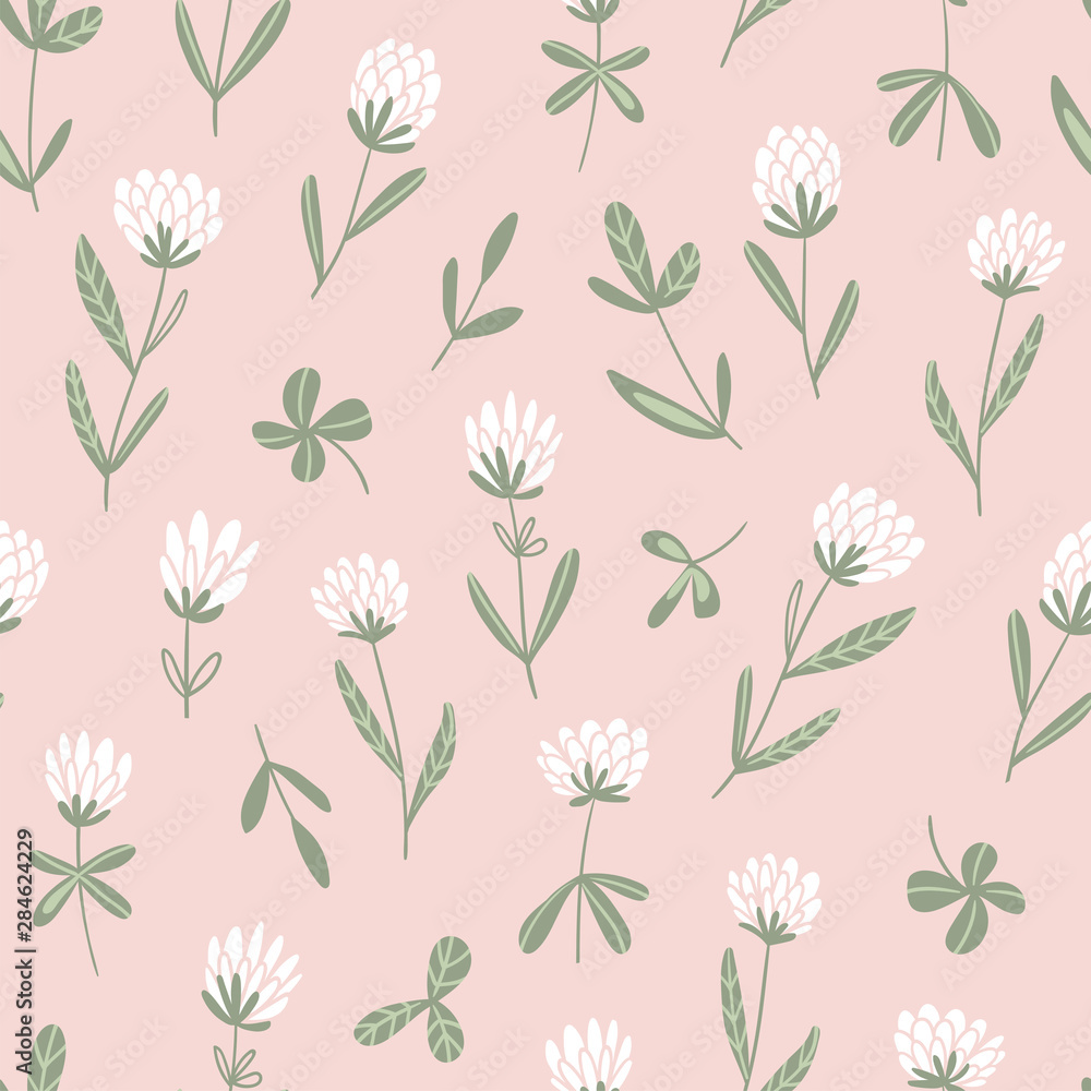 White clover flowers on pink
