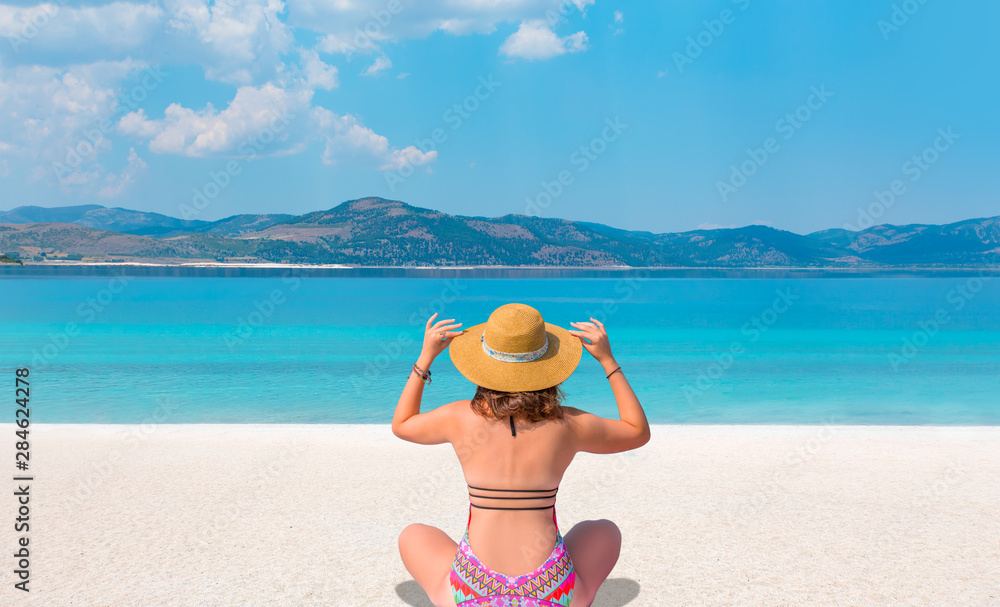 Girl relax on the beach of Salda Lake - Burdur, Turkey Girl relax on the beach of Salda Lake - Burdur, Turkey