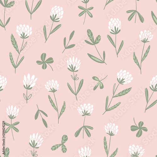 White clover flowers.  Vector floral seamless pattern. Cute hand-drawn  pattern design for fabric, wallpaper or wrap paper.