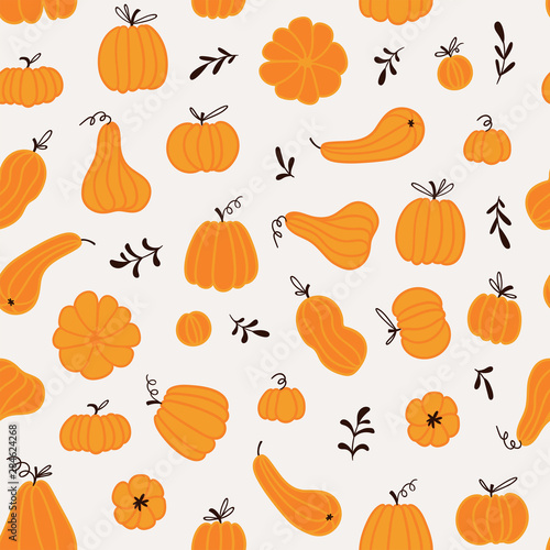 Seamless pattern with hand drawn pumpkins and leaves. Cute design  for Halloween or Thankful day. Vector vegetable illustration.