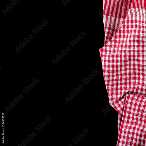 dark wood background and red checkered napkin