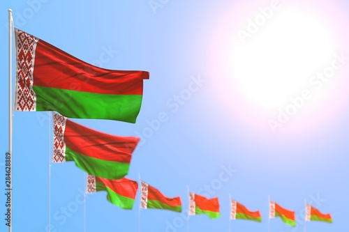 wonderful national holiday flag 3d illustration. - many Belarus flags placed diagonal with bokeh and empty place for your content