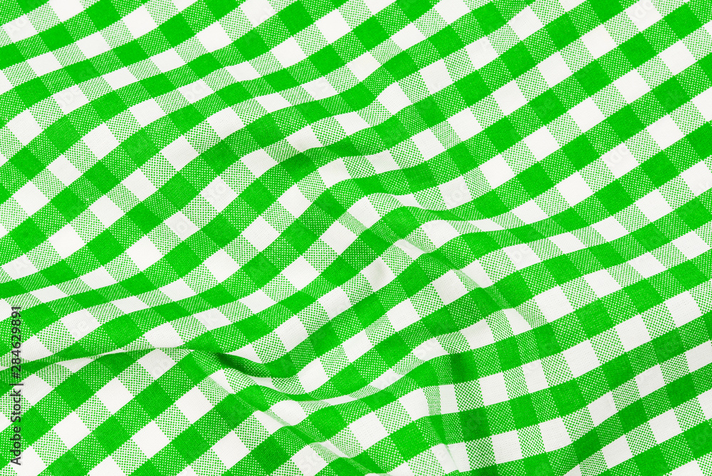 Green napkin isolated on white background. Copy space. Green napkin isolated on white background. Copy space.