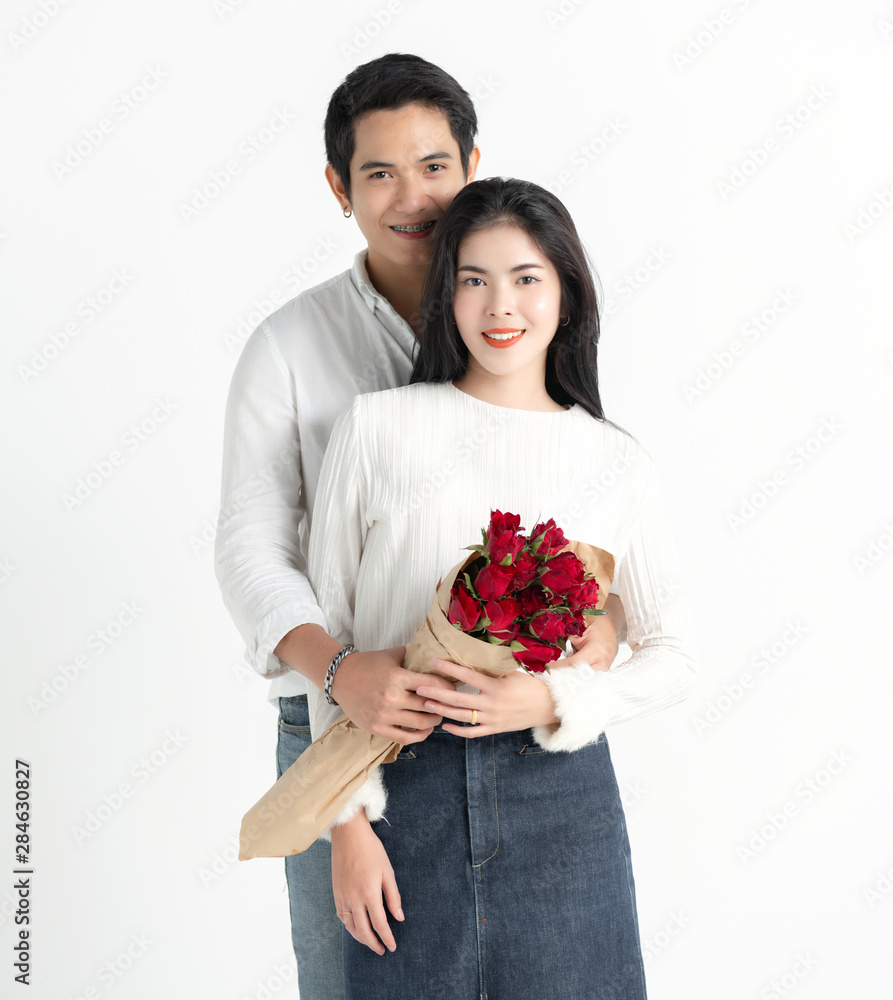 valentines day, love and people concept - happy couple with red heart shaped balloons, Roses, Big Red heart Paper over white background valentines day, love and people concept - happy couple with red heart shaped balloons, Roses, Big Red heart Paper over white background