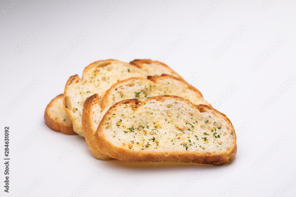 Slice garlic bread on white background